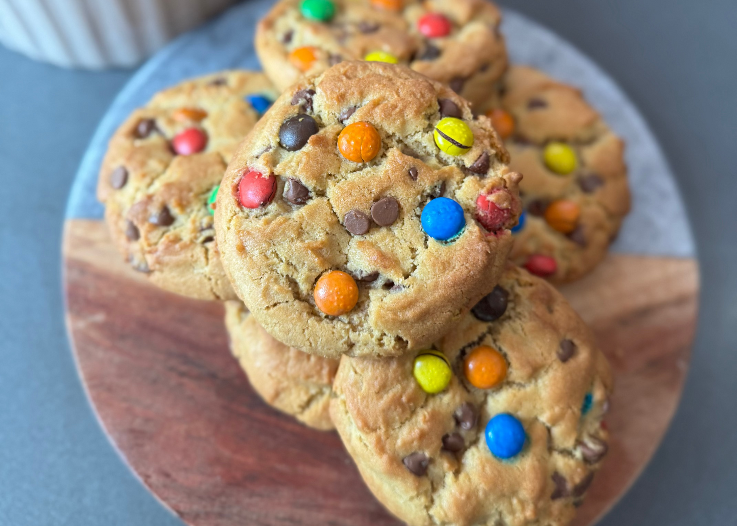 Cookies with M&Ms on a wooden board